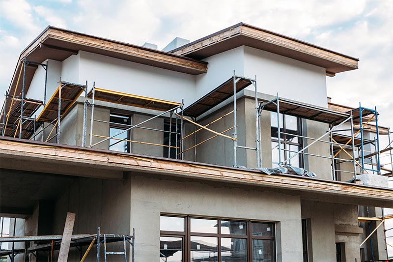 New house construction site seen before home inspection services are scheduled 